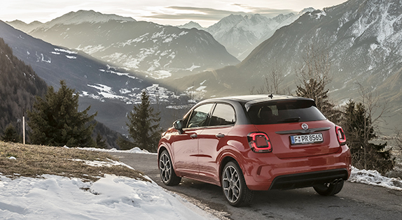 Fiat 500X on a mountain road. Fiat windscreen repair package